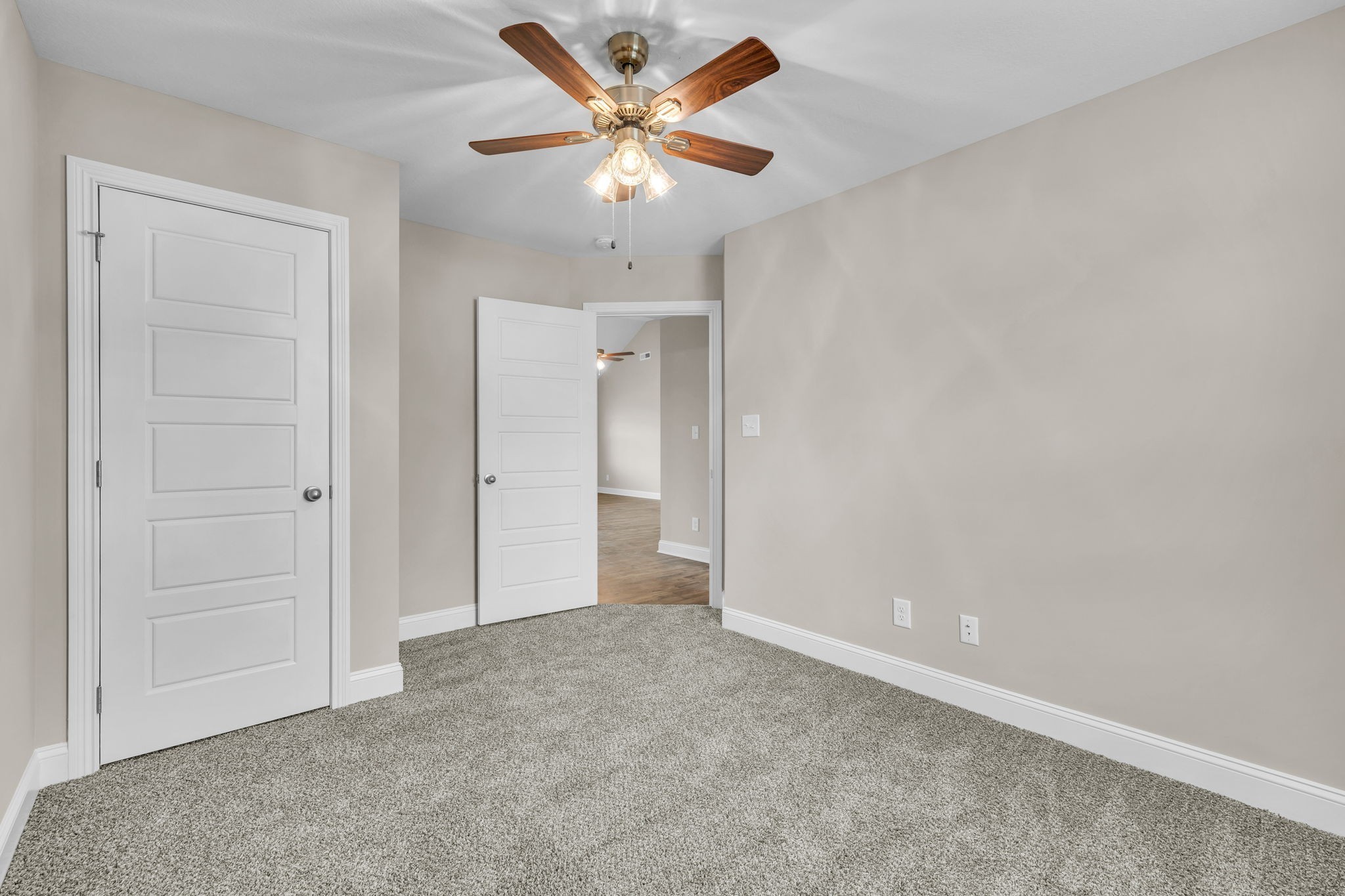 631 Avondale Road Oak Grove, KY 42262 - Photo 21 of 48 an empty room with a ceiling fan and a window