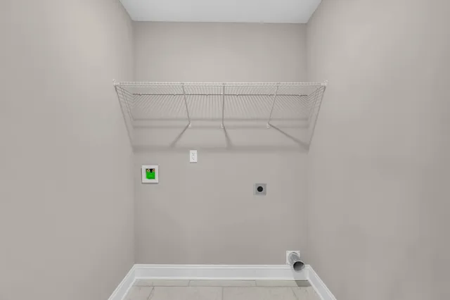 a view of storage and utility room with a sink