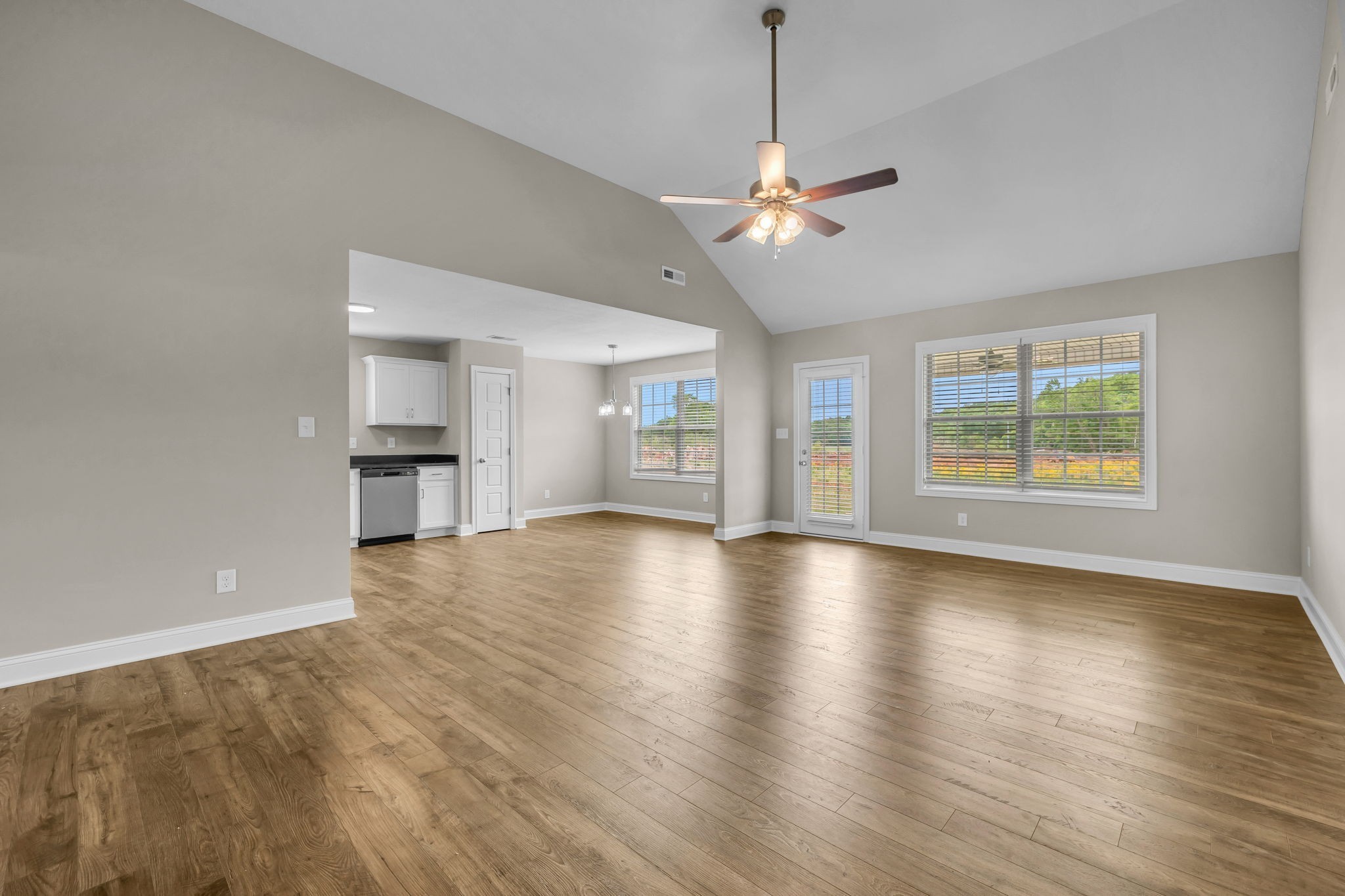 631 Avondale Road Oak Grove, KY 42262 - Photo 7 of 48 a view of an empty room with window and wooden floor