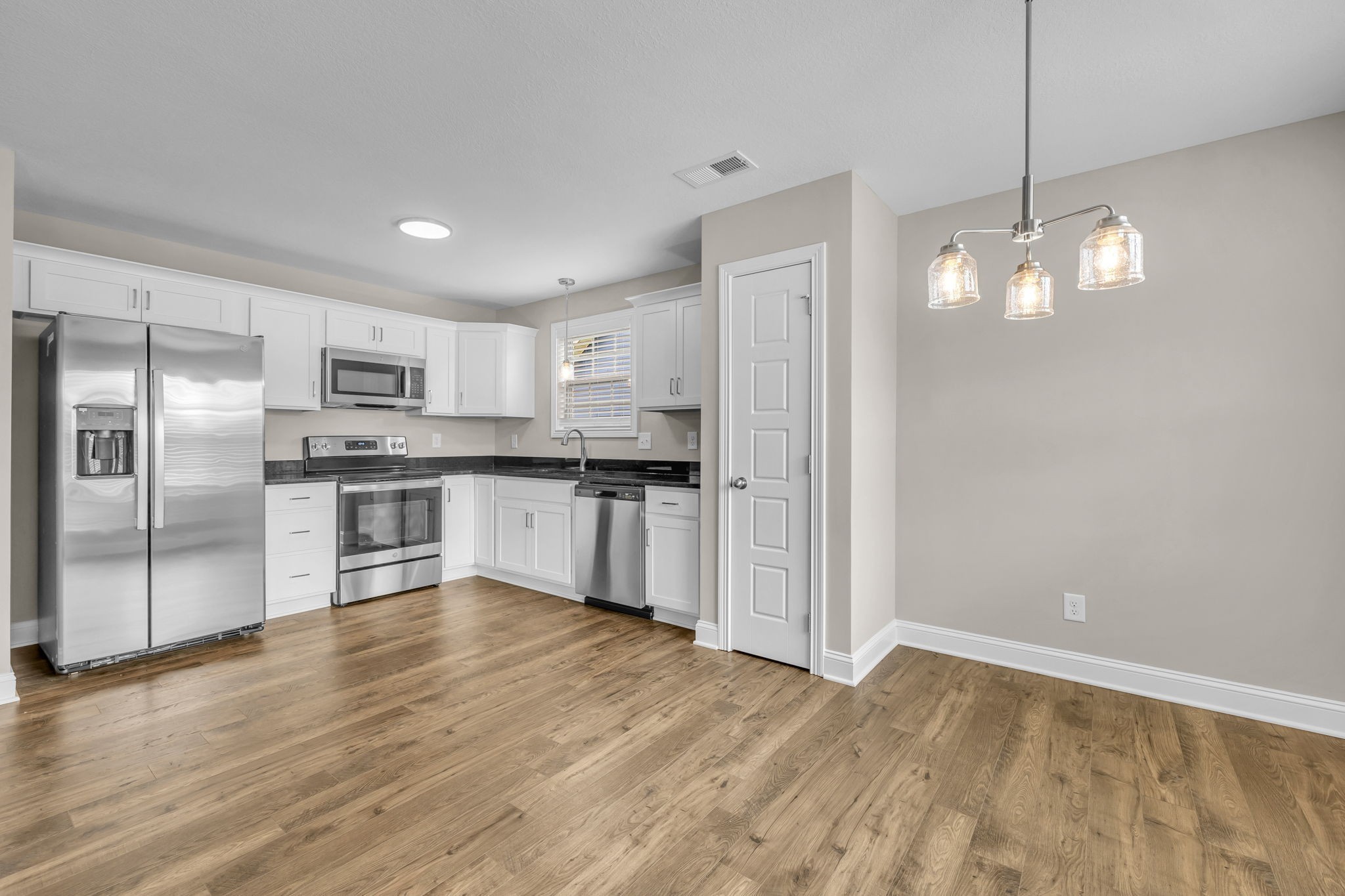 631 Avondale Road Oak Grove, KY 42262 - Photo 9 of 48 a kitchen with stainless steel appliances granite countertop a refrigerator and a sink