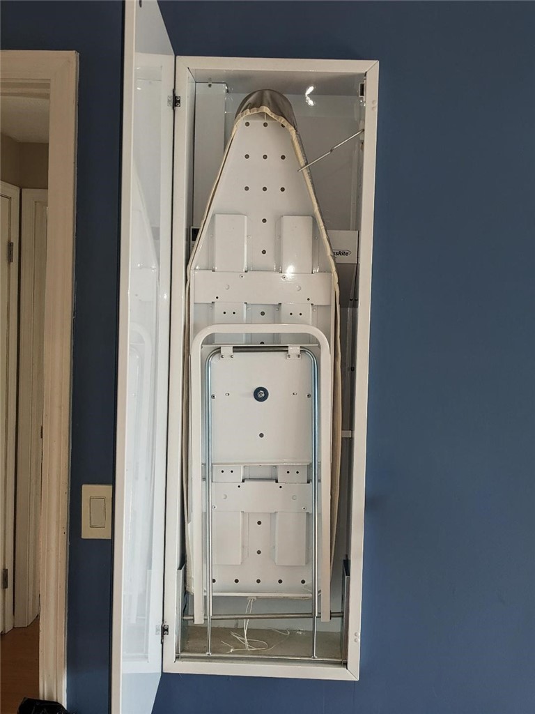80 Genesee View Trail Chili, NY 14623 - Photo 7 of 21 built-in ironing board in master suite