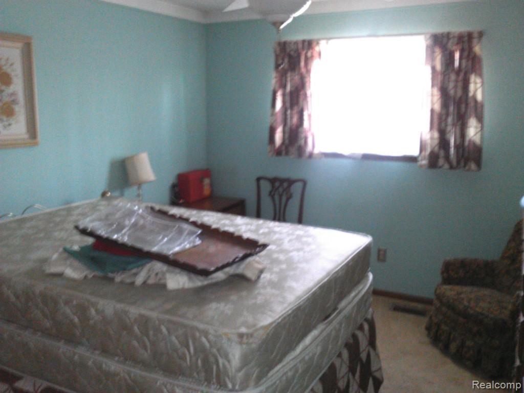 9260 Springborn Road Casco, MI 48064 - Photo 21 of 29 Bedroom three.