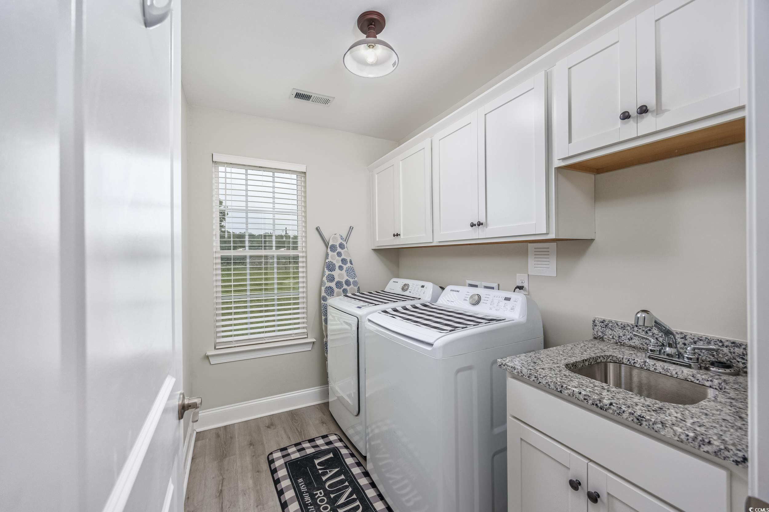 2900 Cherry Hill Road Loris, SC 29569 - Photo 12 of 34 Washroom with light wood-style flooring, separate