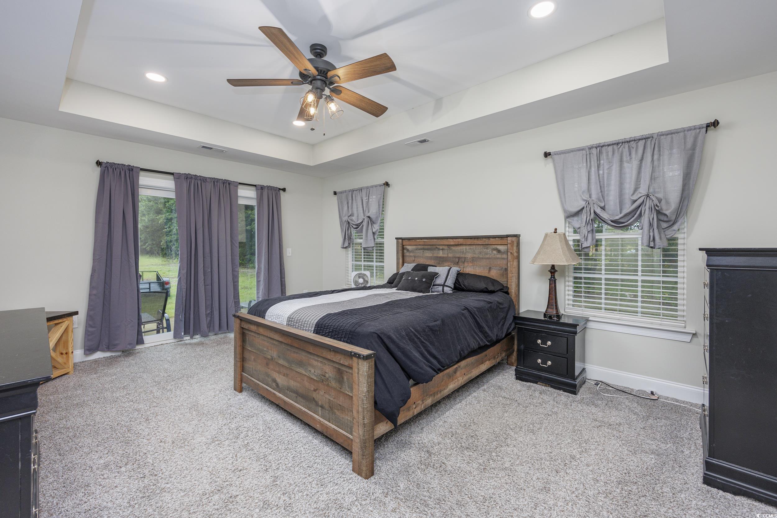 2900 Cherry Hill Road Loris, SC 29569 - Photo 14 of 34 Bedroom featuring a tray ceiling, carpet, recessed