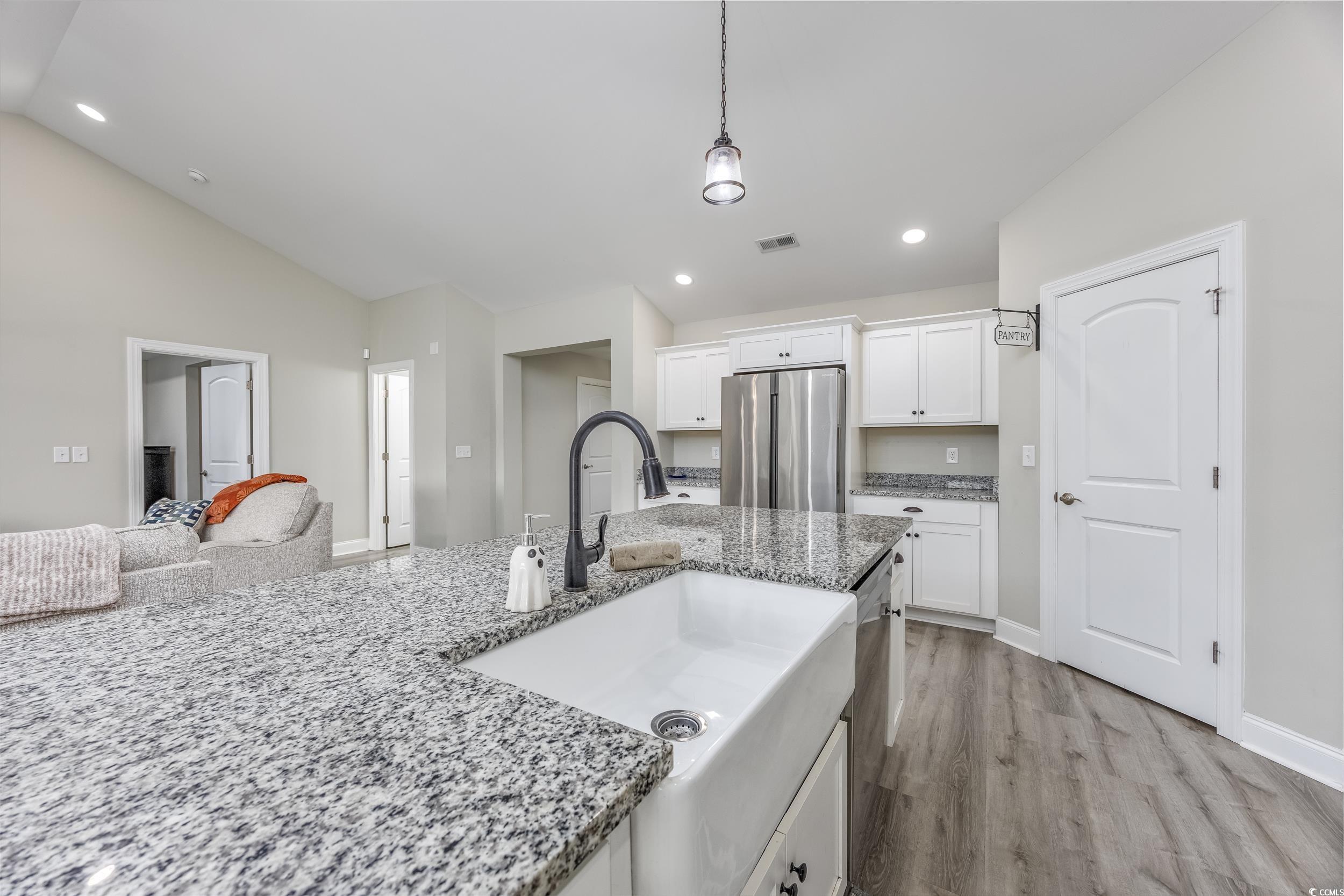 2900 Cherry Hill Road Loris, SC 29569 - Photo 9 of 34 Kitchen featuring light wood-style flooring, appli