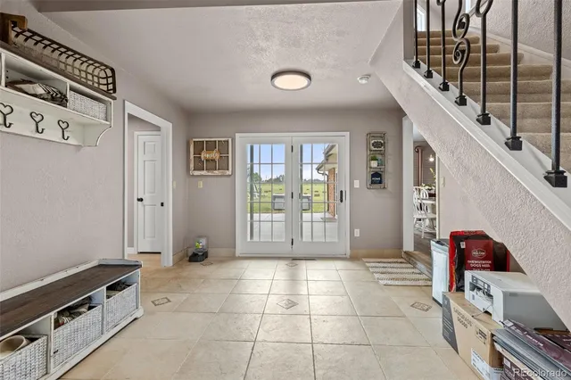 a view of a terrace with a lake view