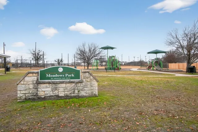 a bathroom with a sink toilet vanity and shower
