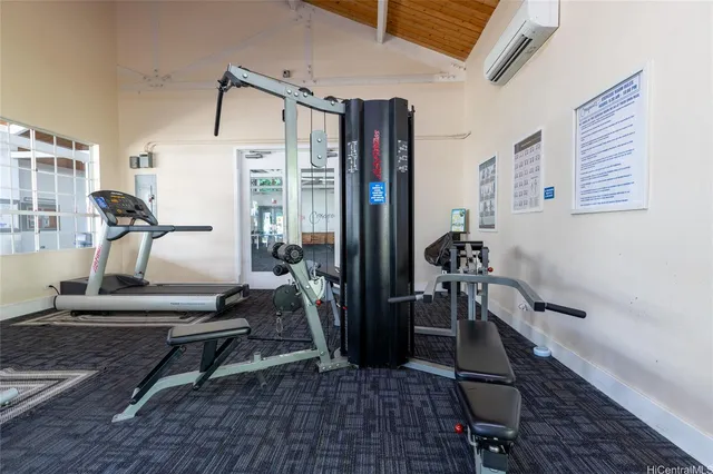 a view of an empty room with a fireplace