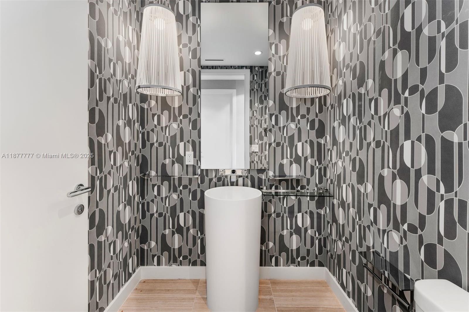 4701 Meridian Avenue, Unit 512 Miami Beach, FL 33140 - Photo 15 of 60 a bathroom with a toilet and shower