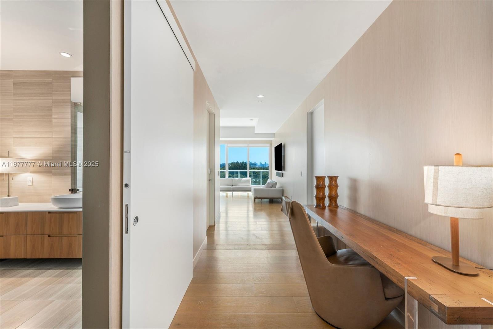 4701 Meridian Avenue, Unit 512 Miami Beach, FL 33140 - Photo 23 of 60 a living room with furniture and a table