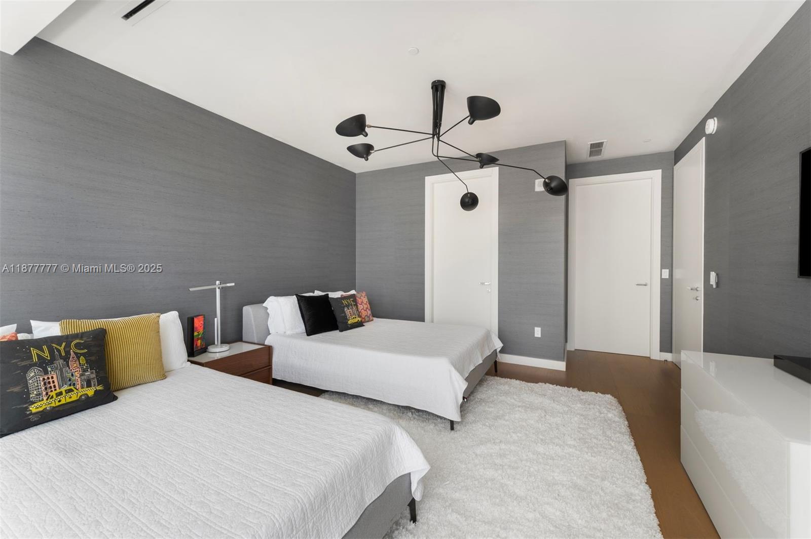 4701 Meridian Avenue, Unit 512 Miami Beach, FL 33140 - Photo 29 of 60 a bedroom with bed and window