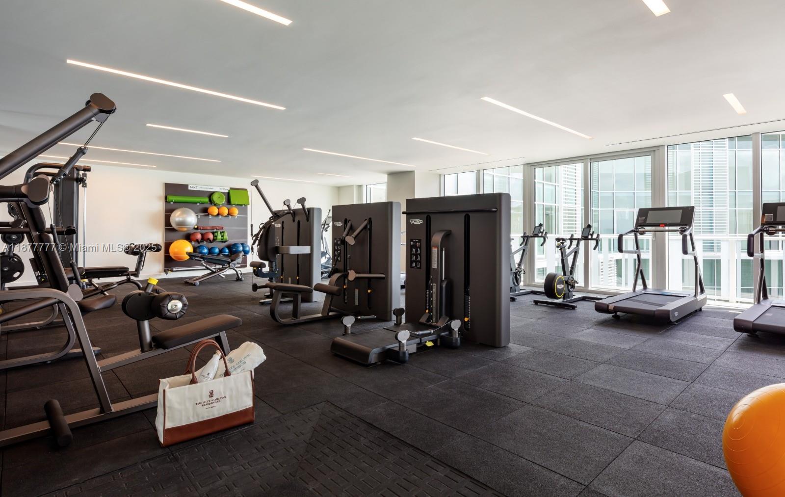 4701 Meridian Avenue, Unit 512 Miami Beach, FL 33140 - Photo 55 of 60 a view of a room with gym equipment