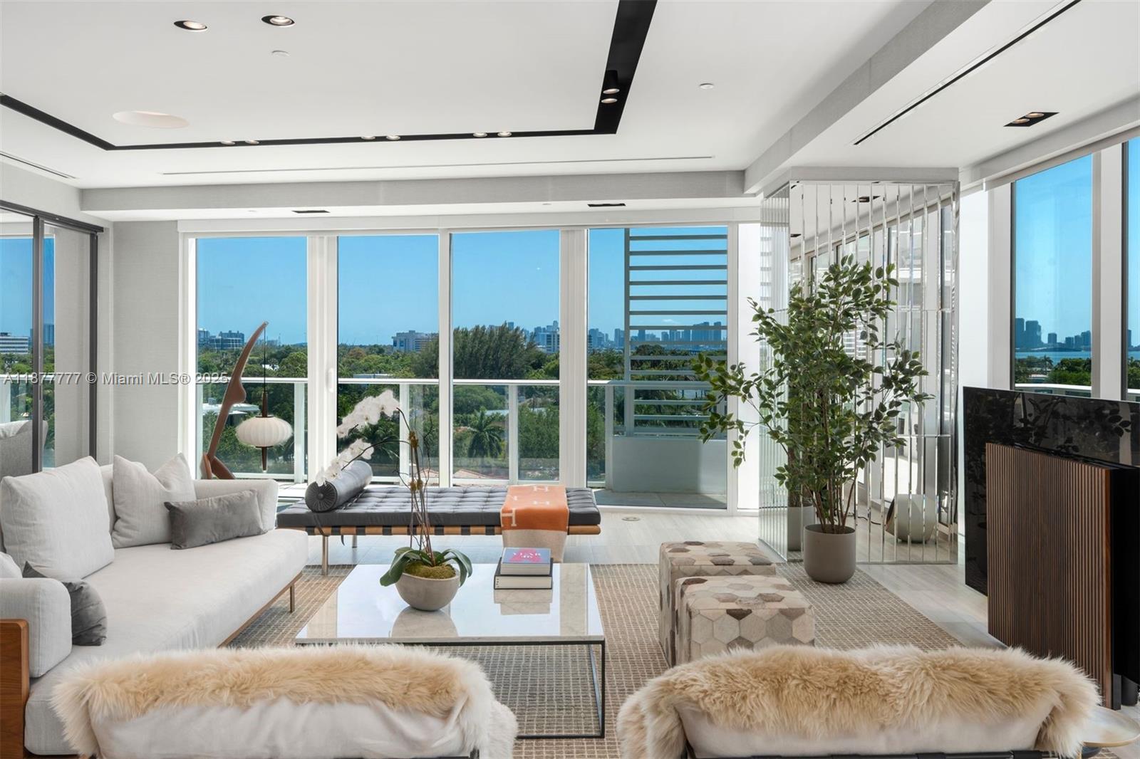 4701 Meridian Avenue, Unit 512 Miami Beach, FL 33140 - Photo 6 of 60 a living room with furniture and a large window