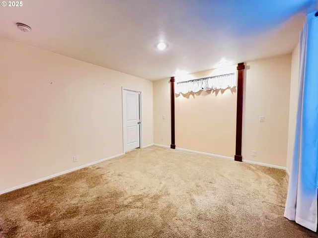 a bathroom with a double vanity sink and mirror