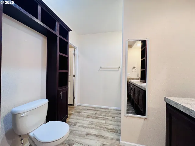 a bathroom with a glass door shower