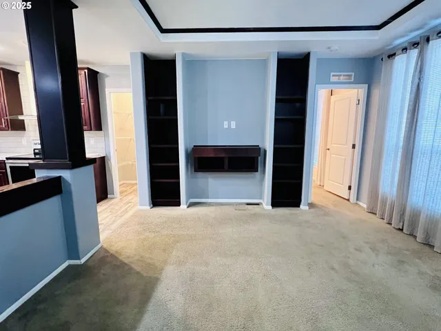 a kitchen with a sink and a stove