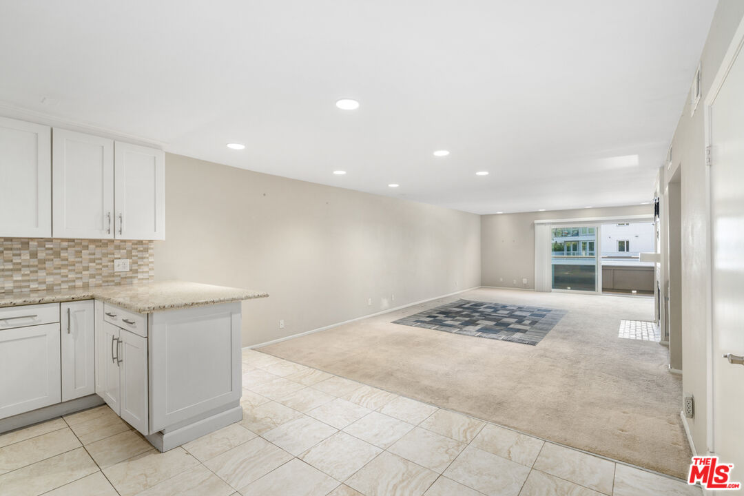 4150 Vía Dolce, Unit 236 Venice, CA 90292 - Photo 11 of 26 a view of kitchen and utility room