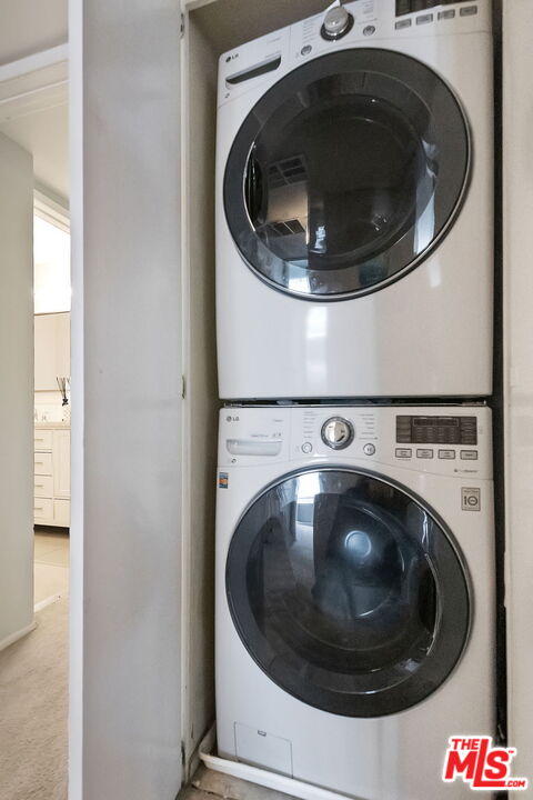 4150 Vía Dolce, Unit 236 Venice, CA 90292 - Photo 21 of 26 a utility room with dryer and washer