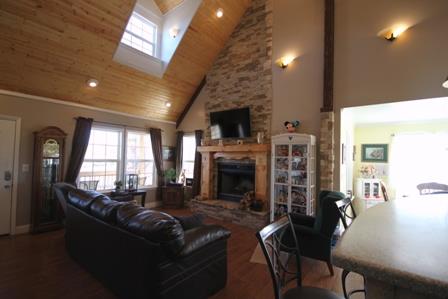 3794 Flewellyn Road Springfield, TN 37172 - Photo 15 of 15 Open floor plan, wood burning fireplace. Beautiful wood vaulted ceiling.