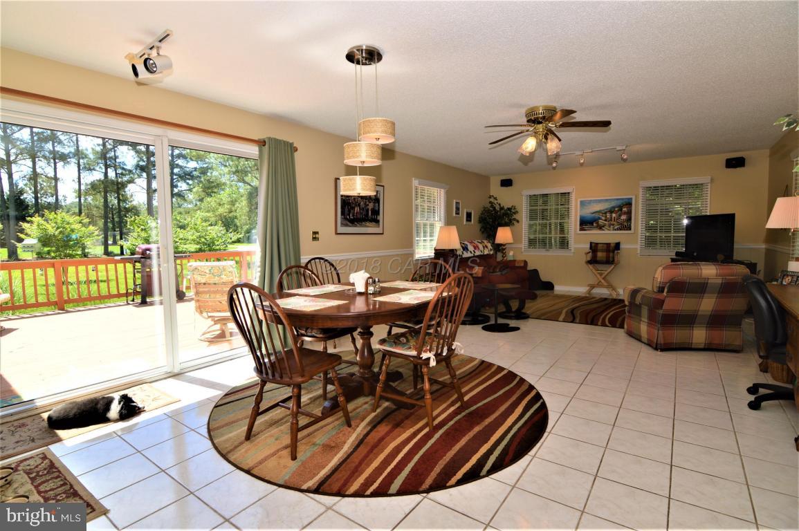 1 Mist Flower Road Ocean Pines, MD 21811 - Photo 22 of 66 a view of a dining room with furniture window and outside view