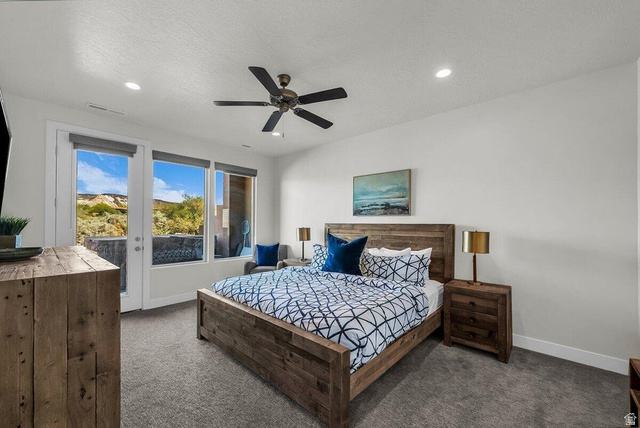 5010 Escapes Drive St. George, UT 84770 - Photo 10 of 46 Bedroom with access to exterior, dark colored carpet, ceiling fan, a textured ceiling, and recessed lighting
