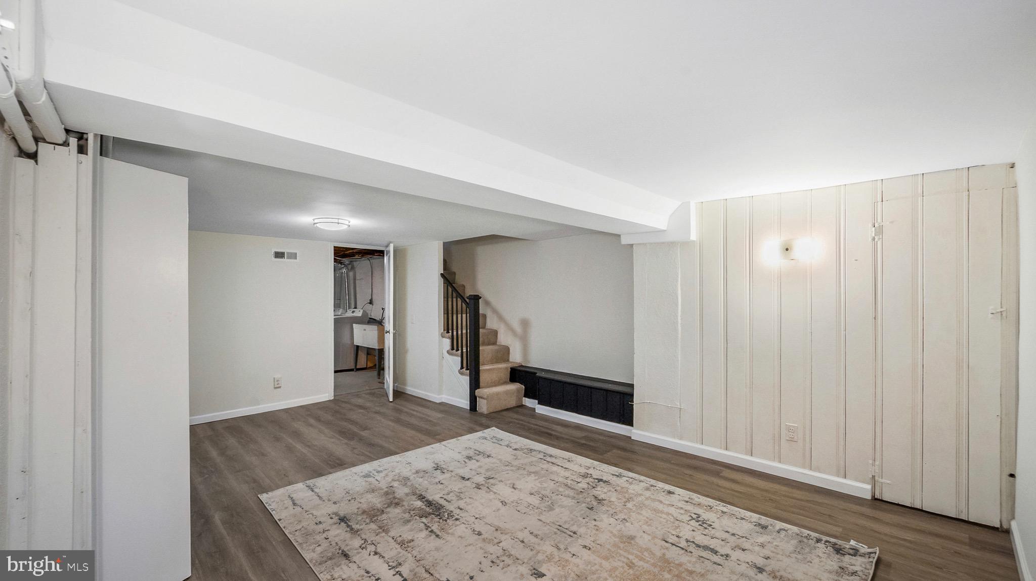 27 North Monastery Avenue Baltimore, MD 21229 - Photo 20 of 26 a view of a room with a hallway