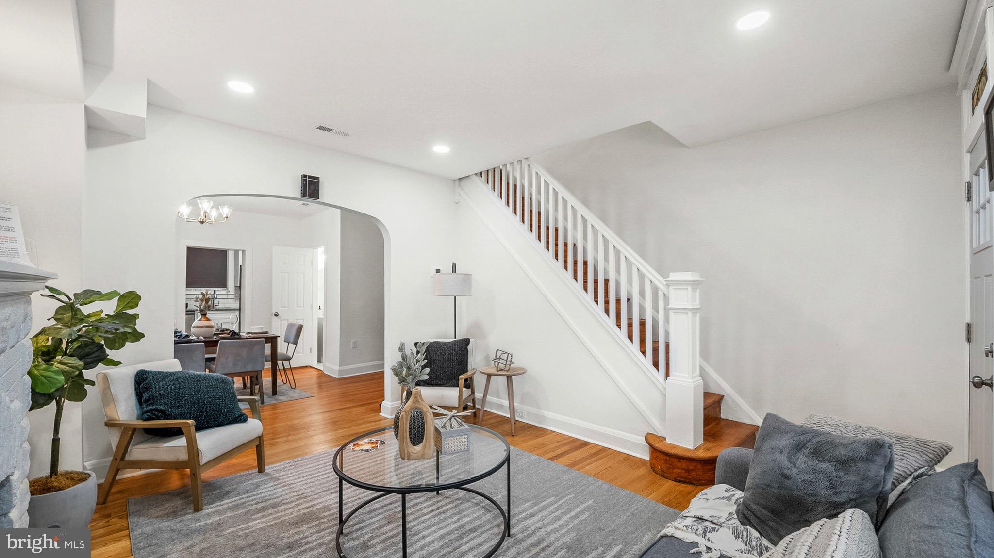 27 North Monastery Avenue Baltimore, MD 21229 - Photo 6 of 26 a living room with furniture and wooden floor