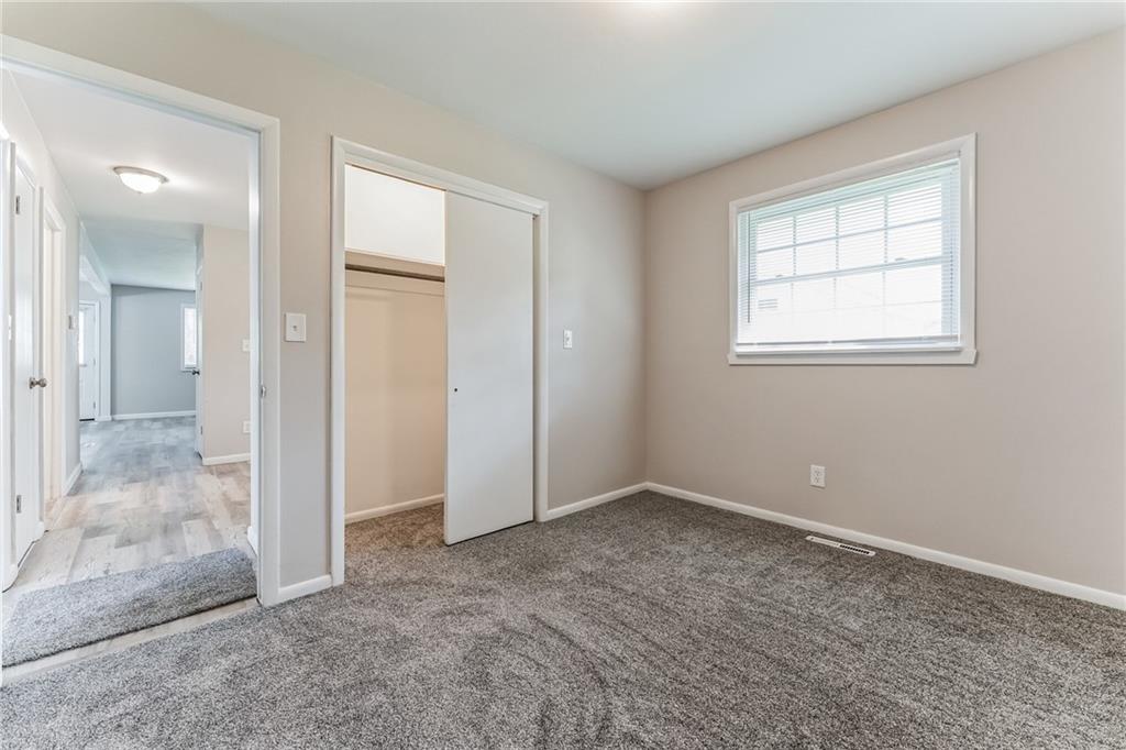 352 Walnut Hill Road Uniontown, PA 15401 - Photo 17 of 30 an empty room with windows and closet