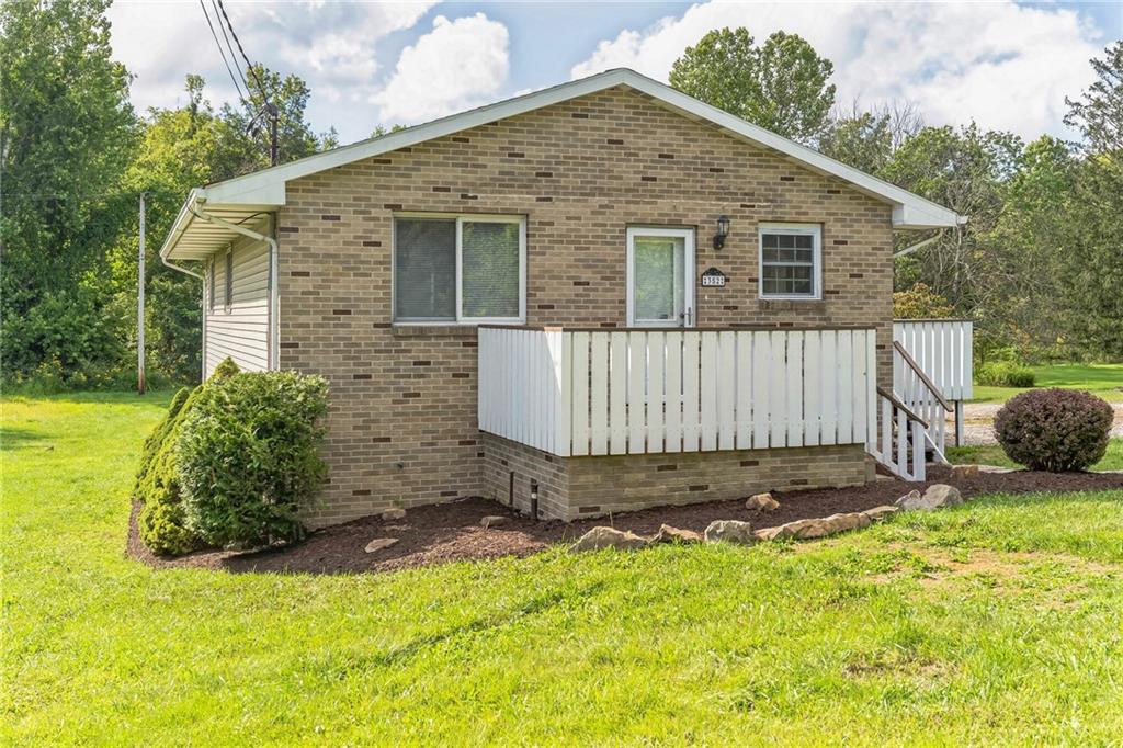 352 Walnut Hill Road Uniontown, PA 15401 - Photo 25 of 30 a view of a house with backyard and trees