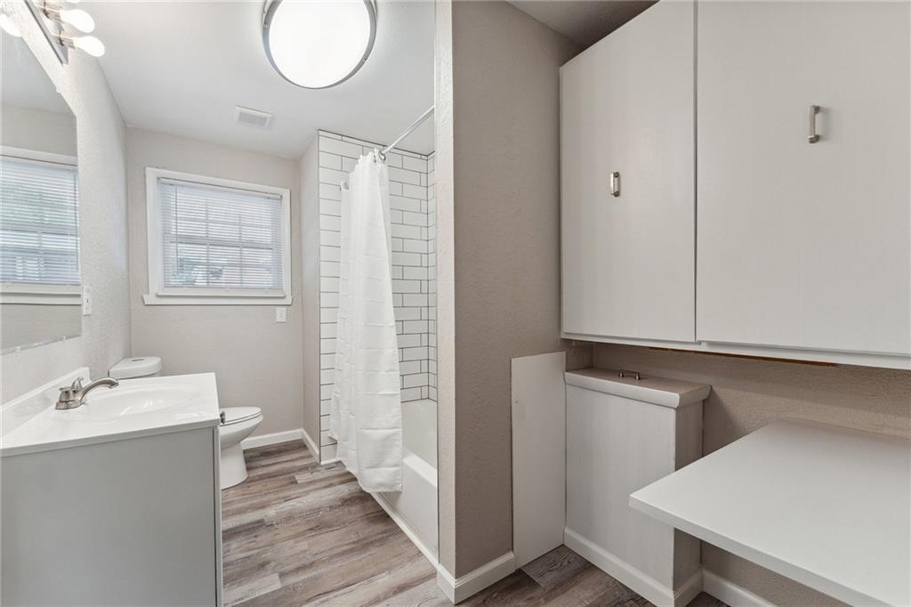 352 Walnut Hill Road Uniontown, PA 15401 - Photo 30 of 30 a bathroom with a sink a mirror and a toilet