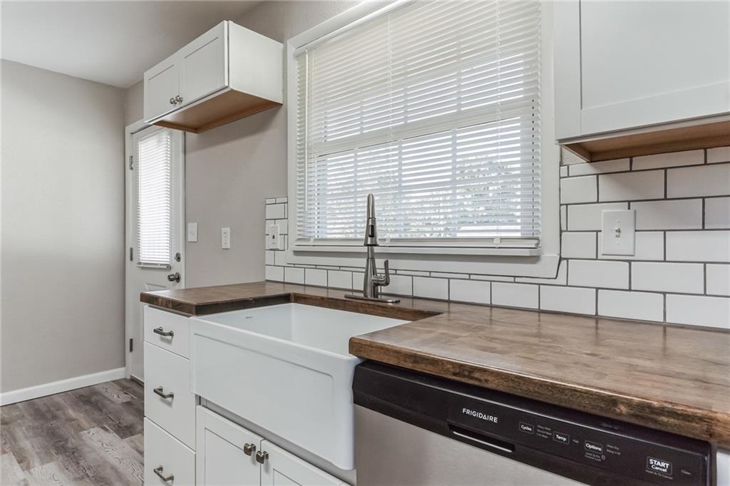 352 Walnut Hill Road Uniontown, PA 15401 - Photo 8 of 30 a kitchen with granite countertop a sink and a stove