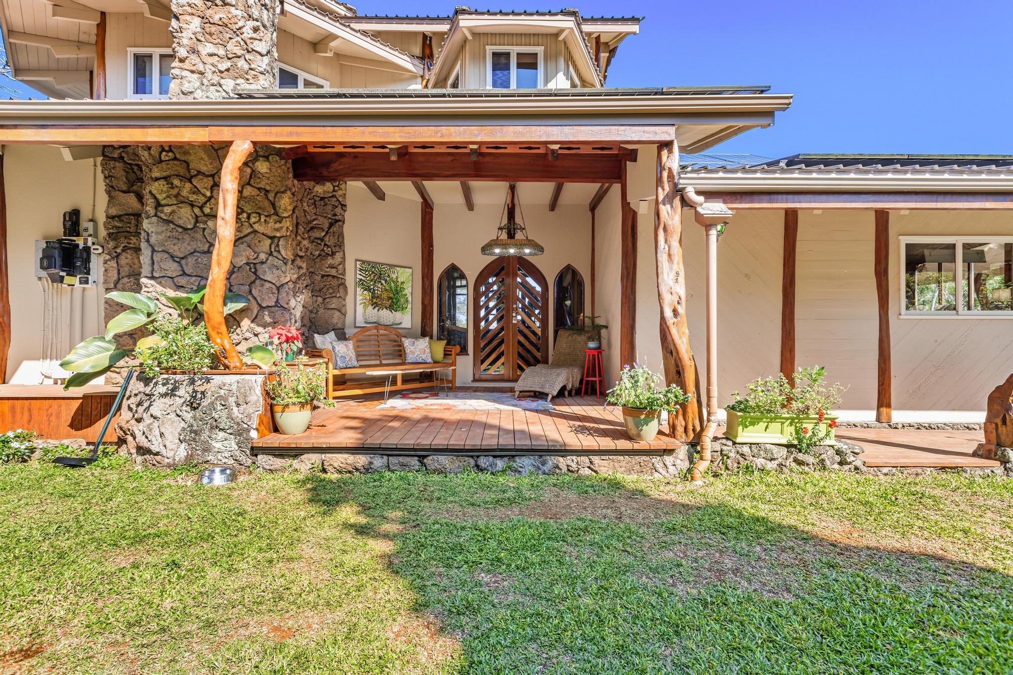 43-5745 Old Stable Road Paauilo, HI 96776 - Photo 7 of 30 a front view of a house with garden