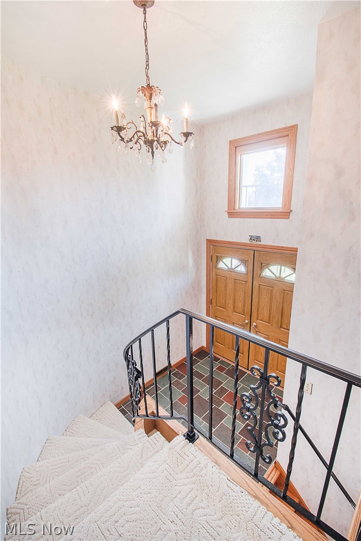 1272 Stewart Road Salem, OH 44460 - Photo 6 of 30 From the moment you enter through the beautiful oak double doors into the foyer, you will see a lovely spiral staircase.