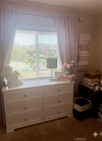 a bathroom with a sink and a window