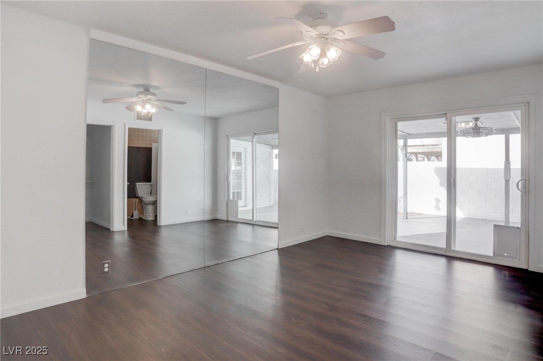 4775 Monaco Road Las Vegas, NV 89121 - Photo 12 of 31 Unfurnished room featuring ceiling fan and dark hardwood / wood-style floors