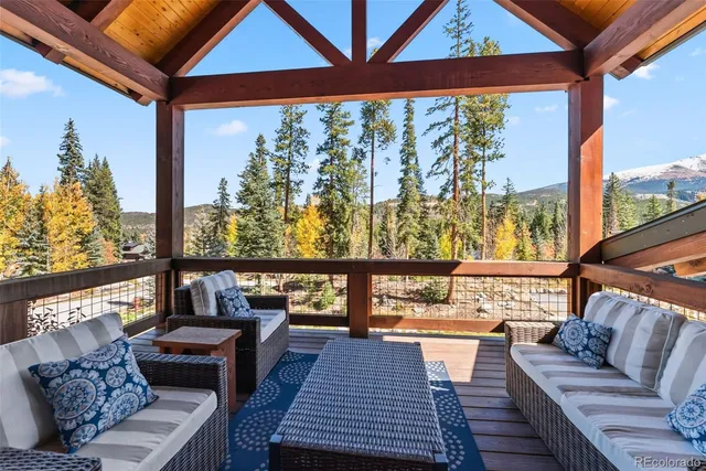 a living room with large windows