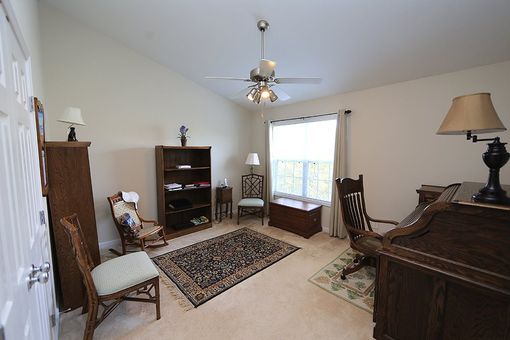 2041 Rivergate Road, Unit 103 Raleigh, NC 27614 - Photo 14 of 21 Second master suite features custom closet and its own full bath, and overlooks the lush backyard Bedroom