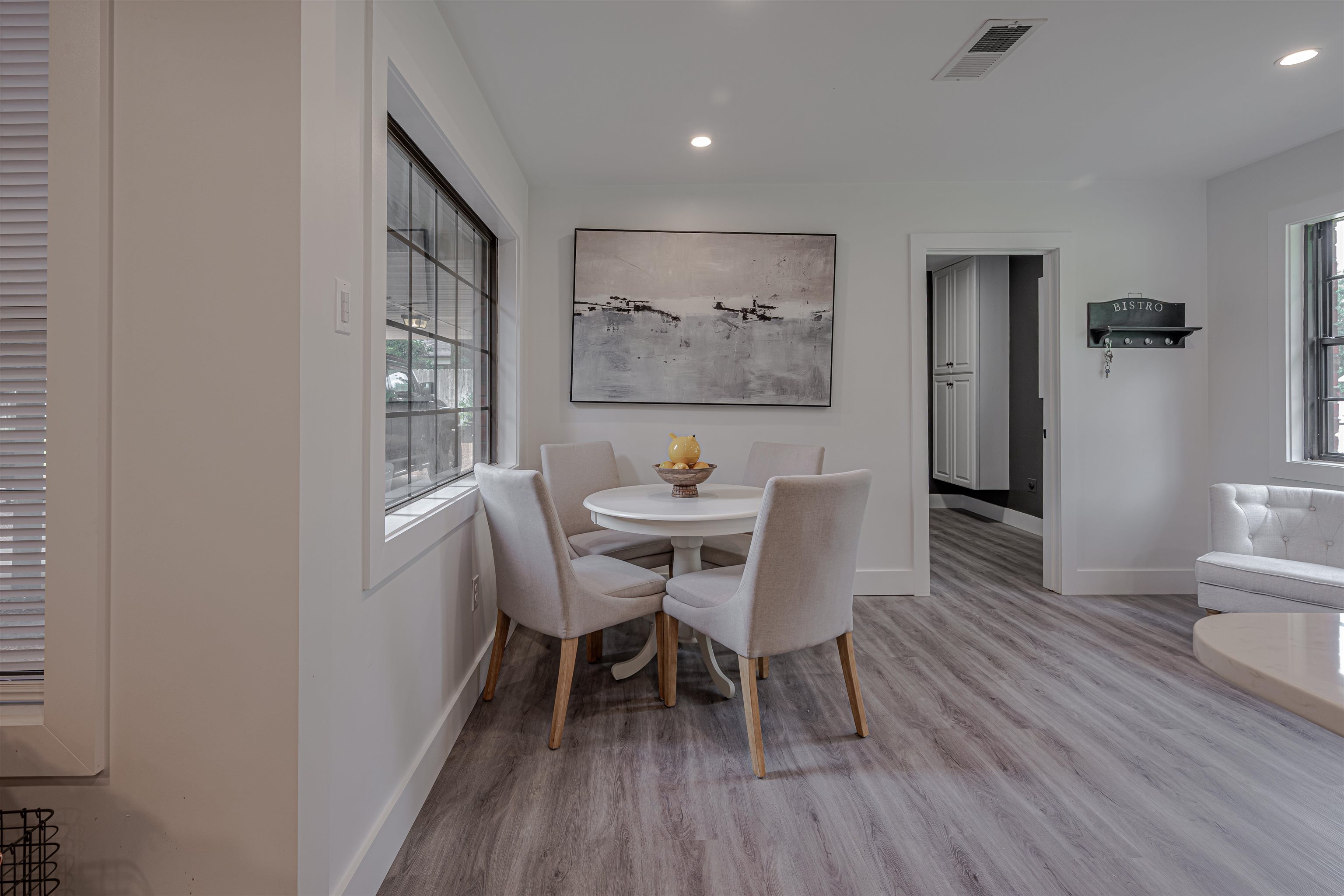 2138 Sonning Drive Germantown, TN 38138 - Photo 15 of 40 a view of a dining room with furniture and wooden floor