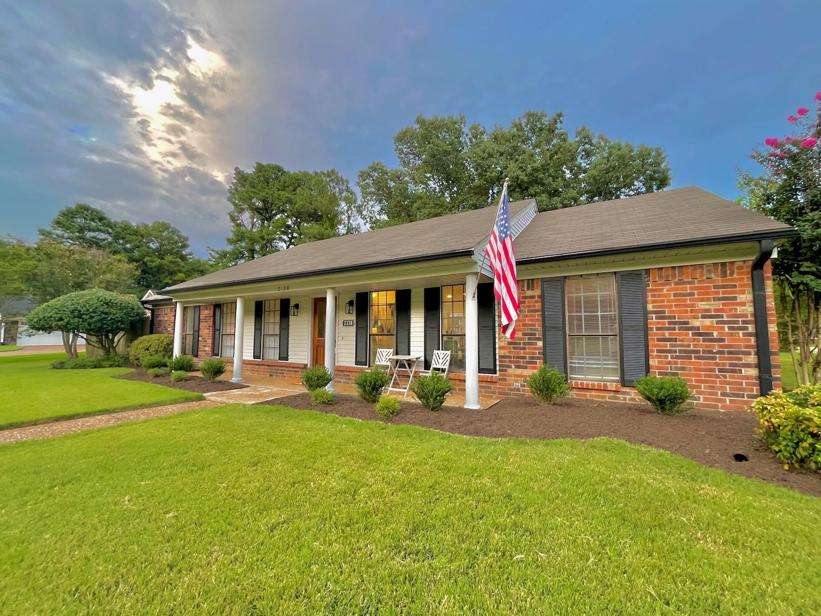 2138 Sonning Drive Germantown, TN 38138 - Photo 2 of 40 a front view of a house with garden