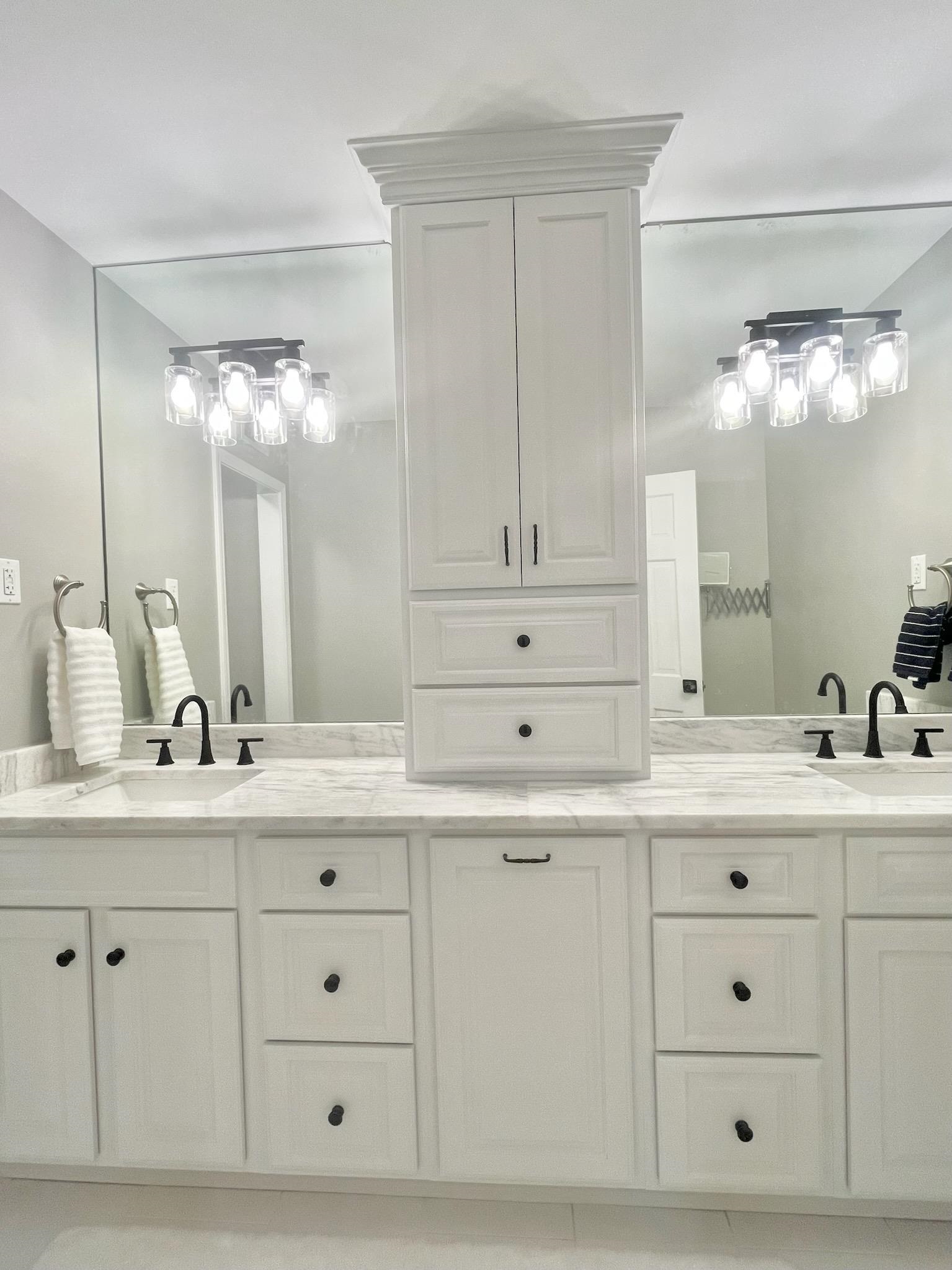 2138 Sonning Drive Germantown, TN 38138 - Photo 23 of 40 a bathroom with a sink vanity and mirror