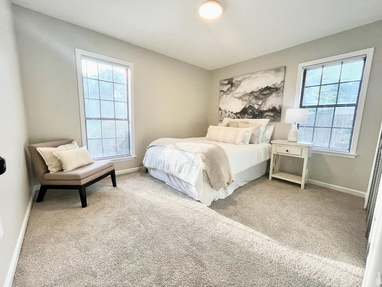 2138 Sonning Drive Germantown, TN 38138 - Photo 25 of 40 a spacious bedroom with a bed and a window