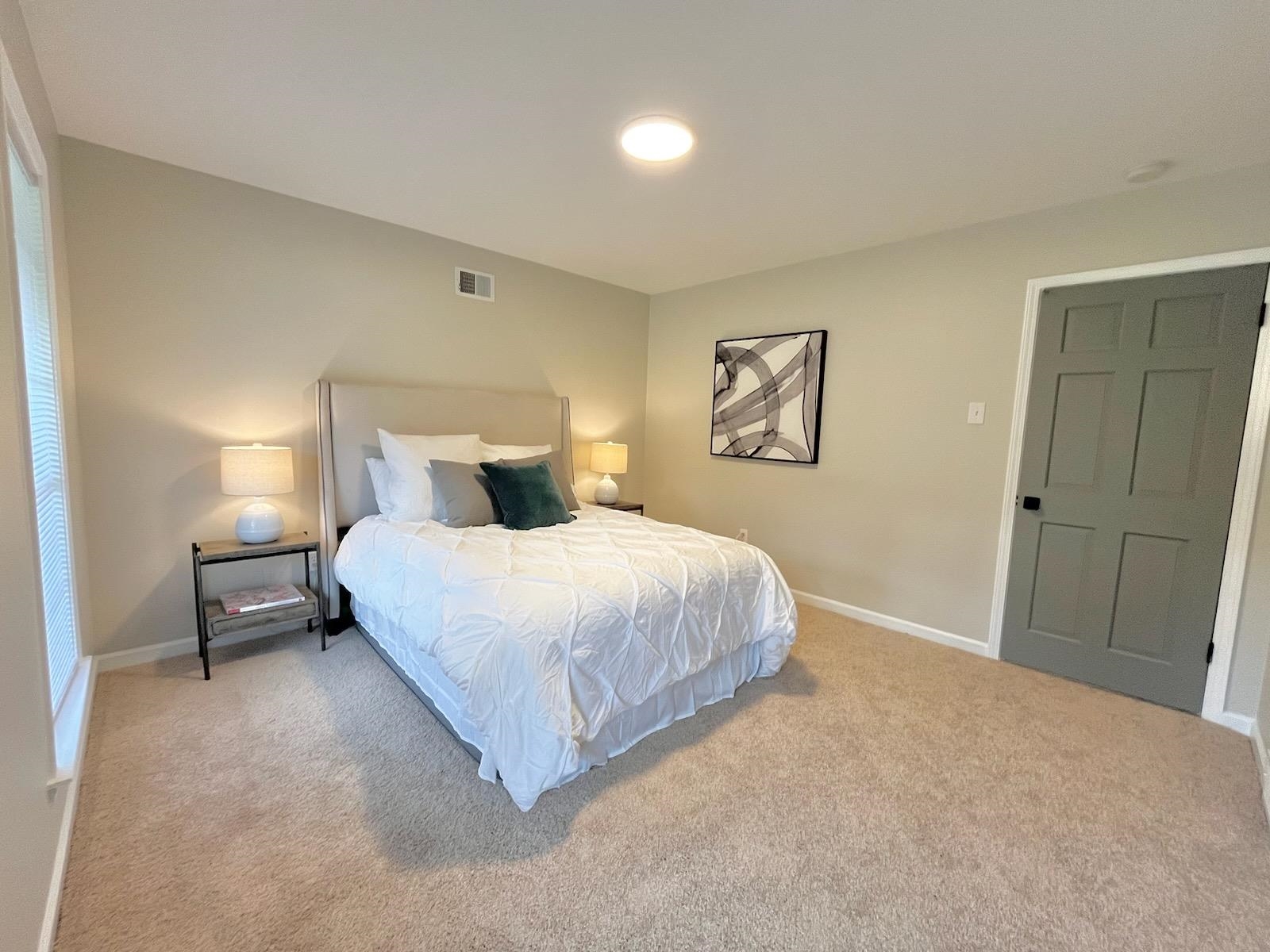 2138 Sonning Drive Germantown, TN 38138 - Photo 27 of 40 a bedroom with a bed and night stand