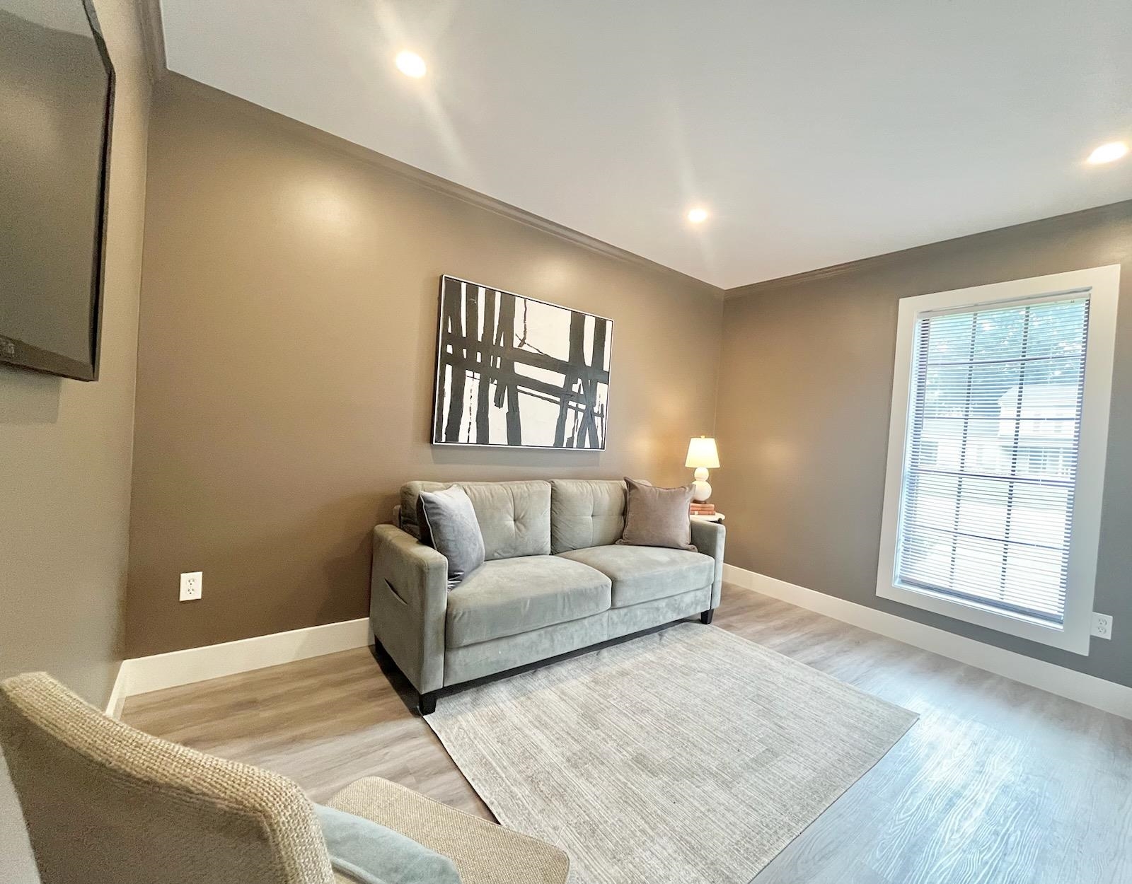 2138 Sonning Drive Germantown, TN 38138 - Photo 28 of 40 a living room with furniture and a window