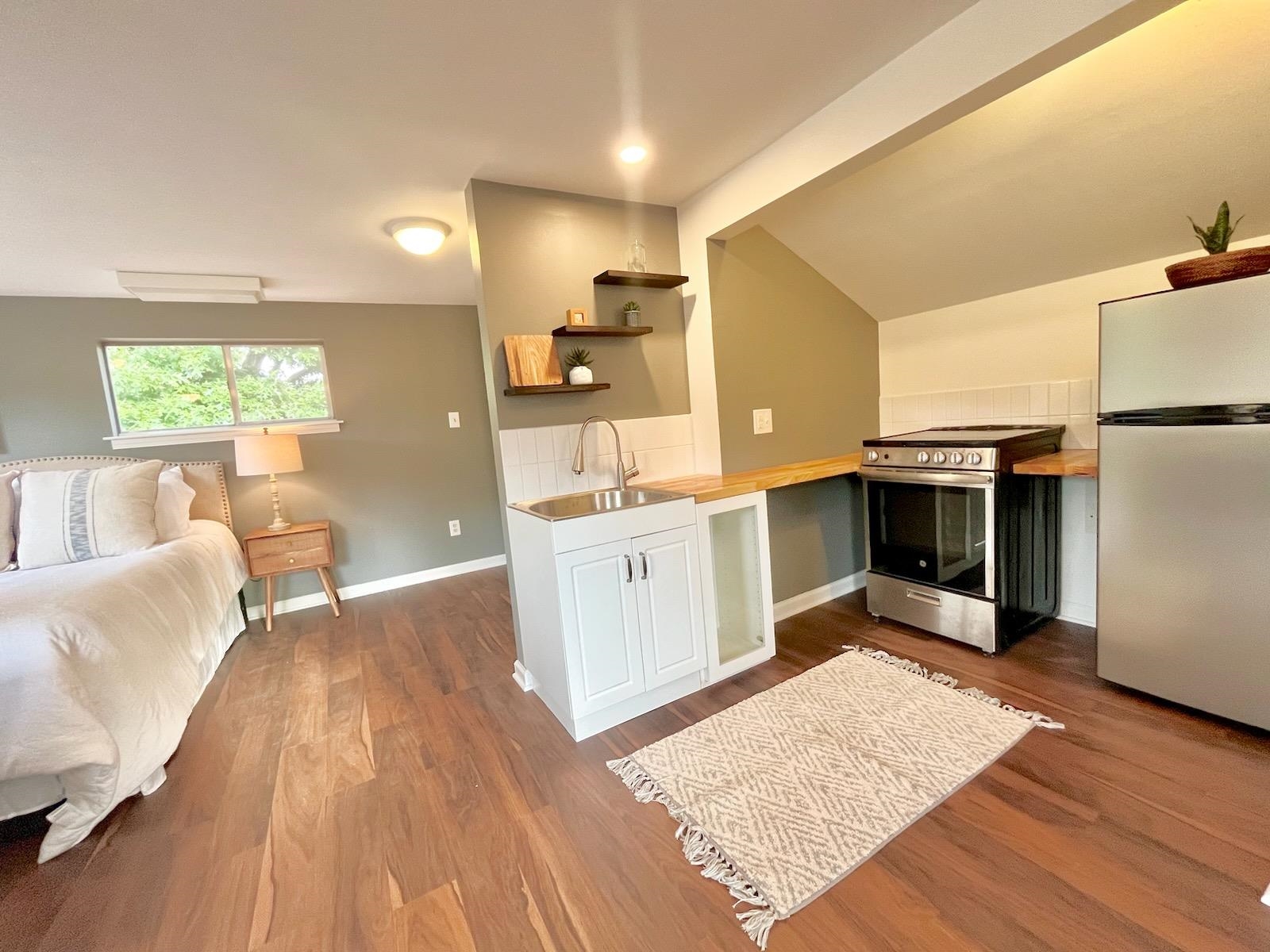2138 Sonning Drive Germantown, TN 38138 - Photo 31 of 40 a view of kitchen with cabinets and wooden floor