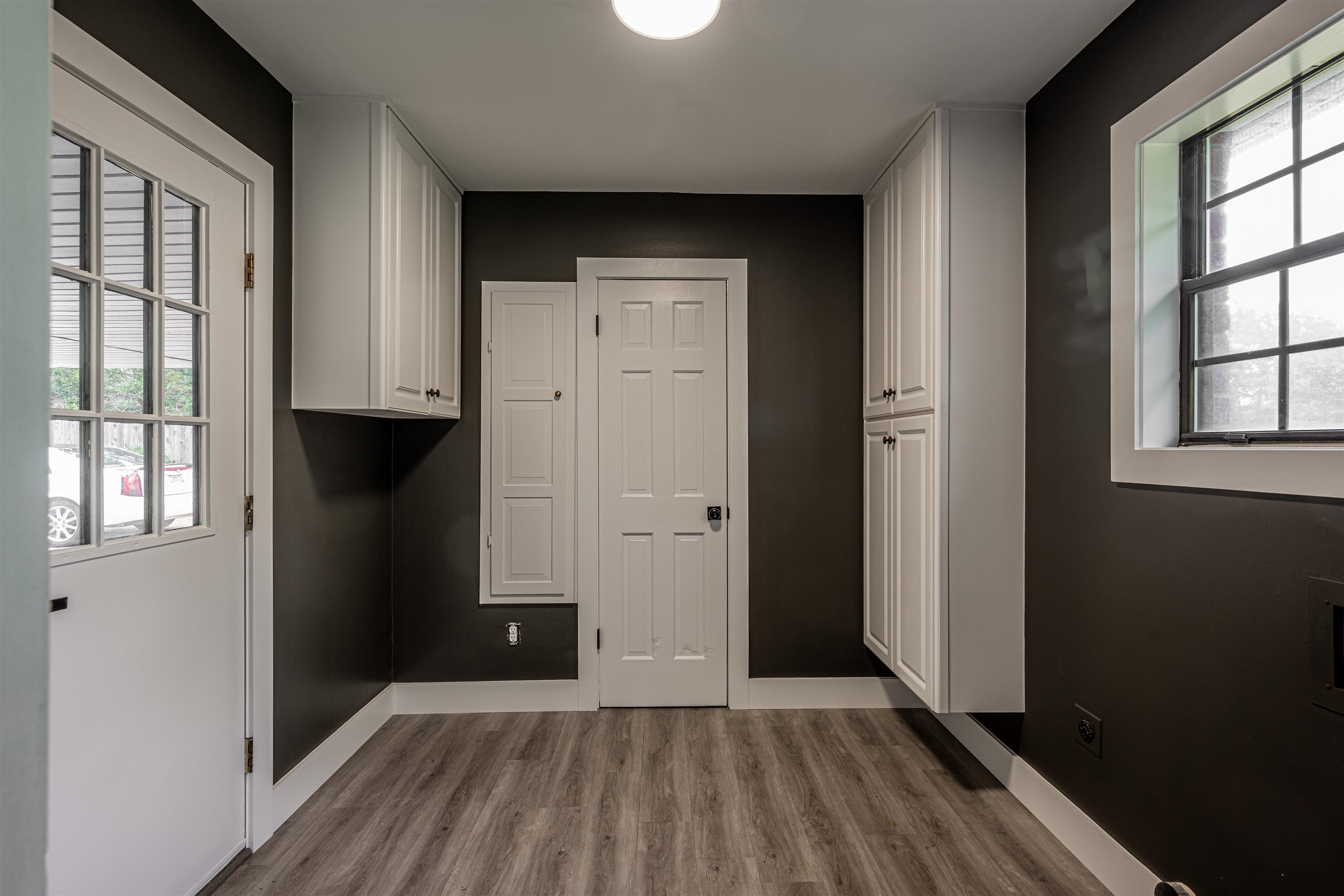 2138 Sonning Drive Germantown, TN 38138 - Photo 37 of 40 an empty room with wooden floor and windows