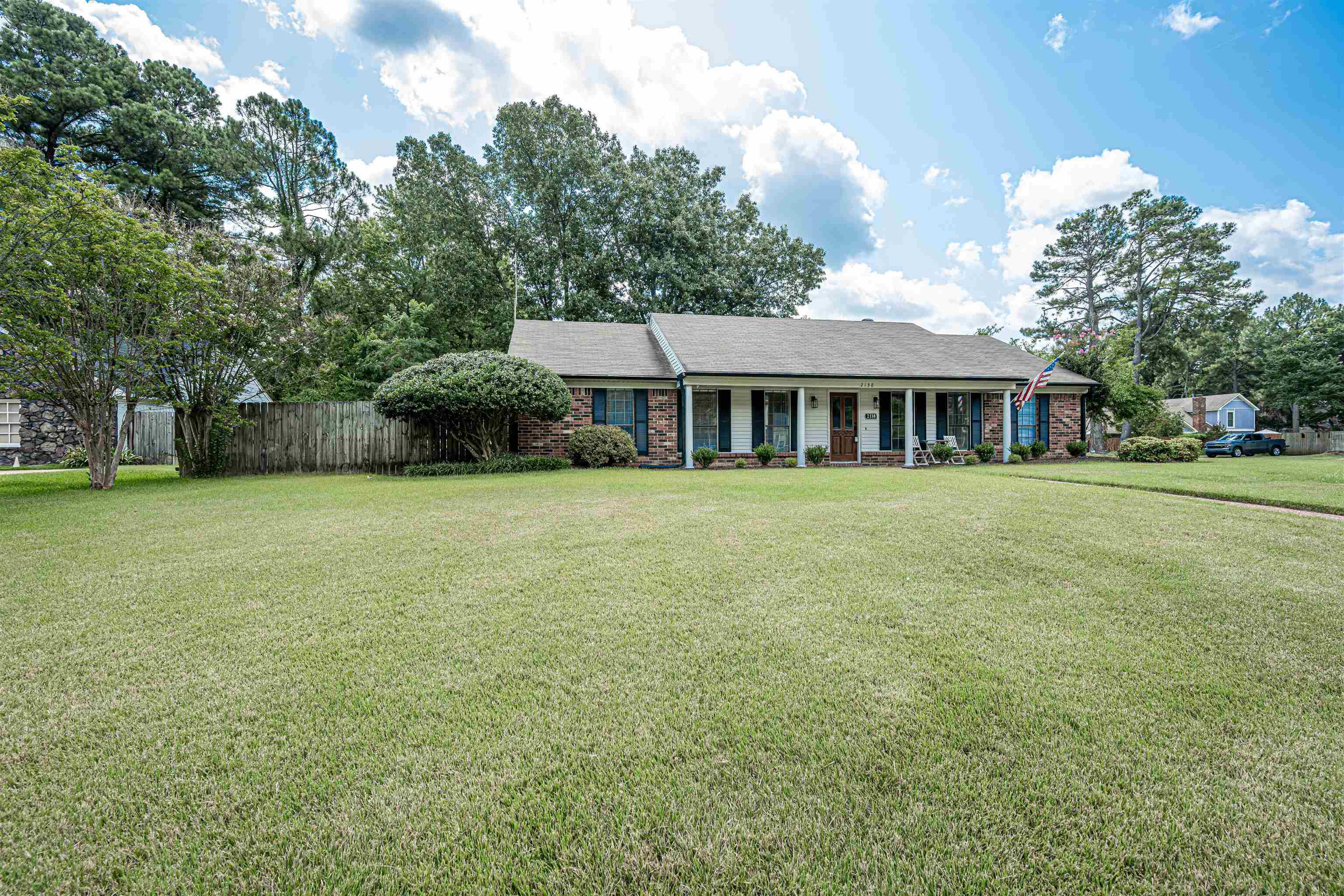2138 Sonning Drive Germantown, TN 38138 - Photo 38 of 40 a view of a house with a yard and sitting area