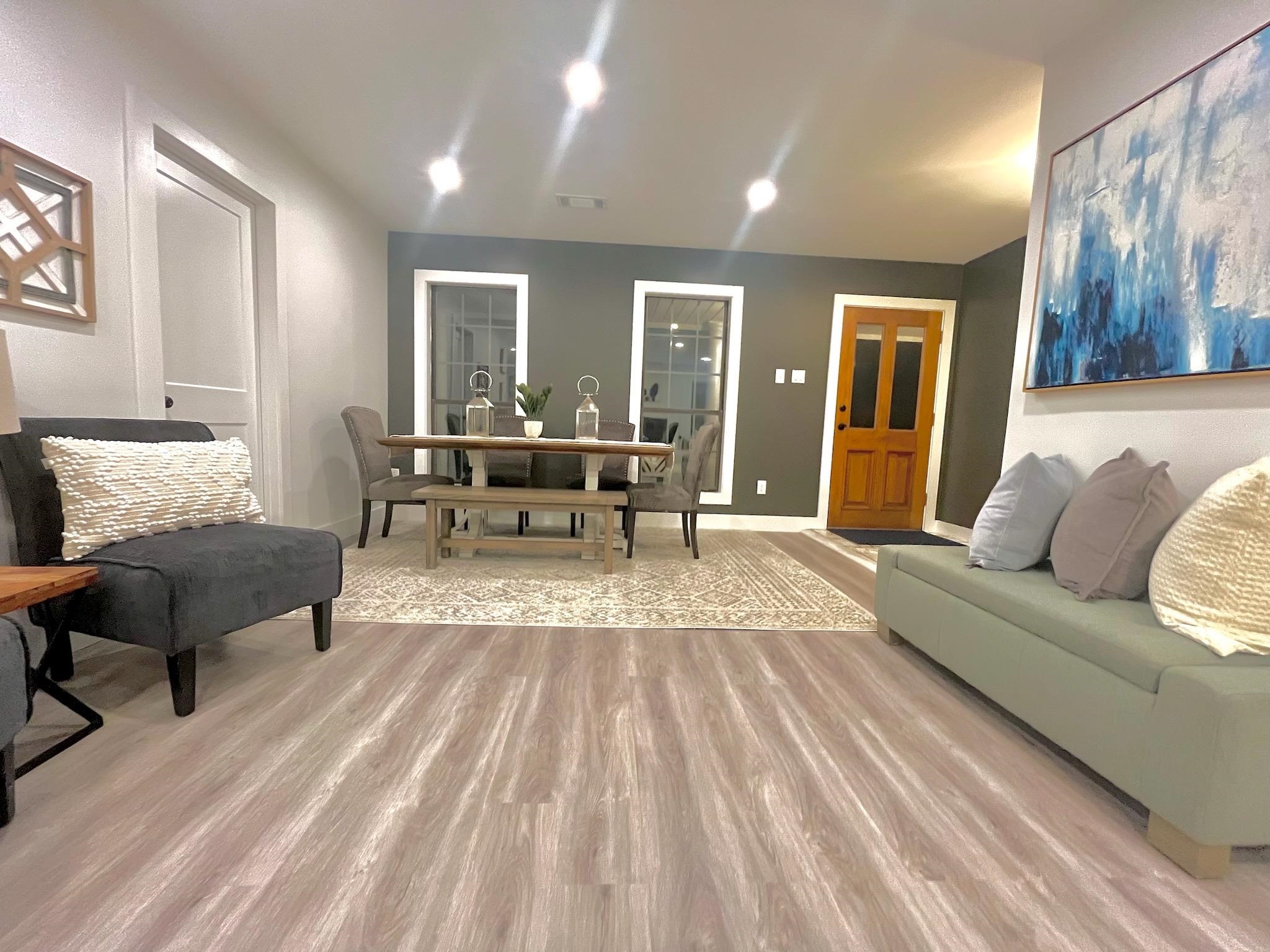 2138 Sonning Drive Germantown, TN 38138 - Photo 7 of 40 a living room with furniture and wooden floor