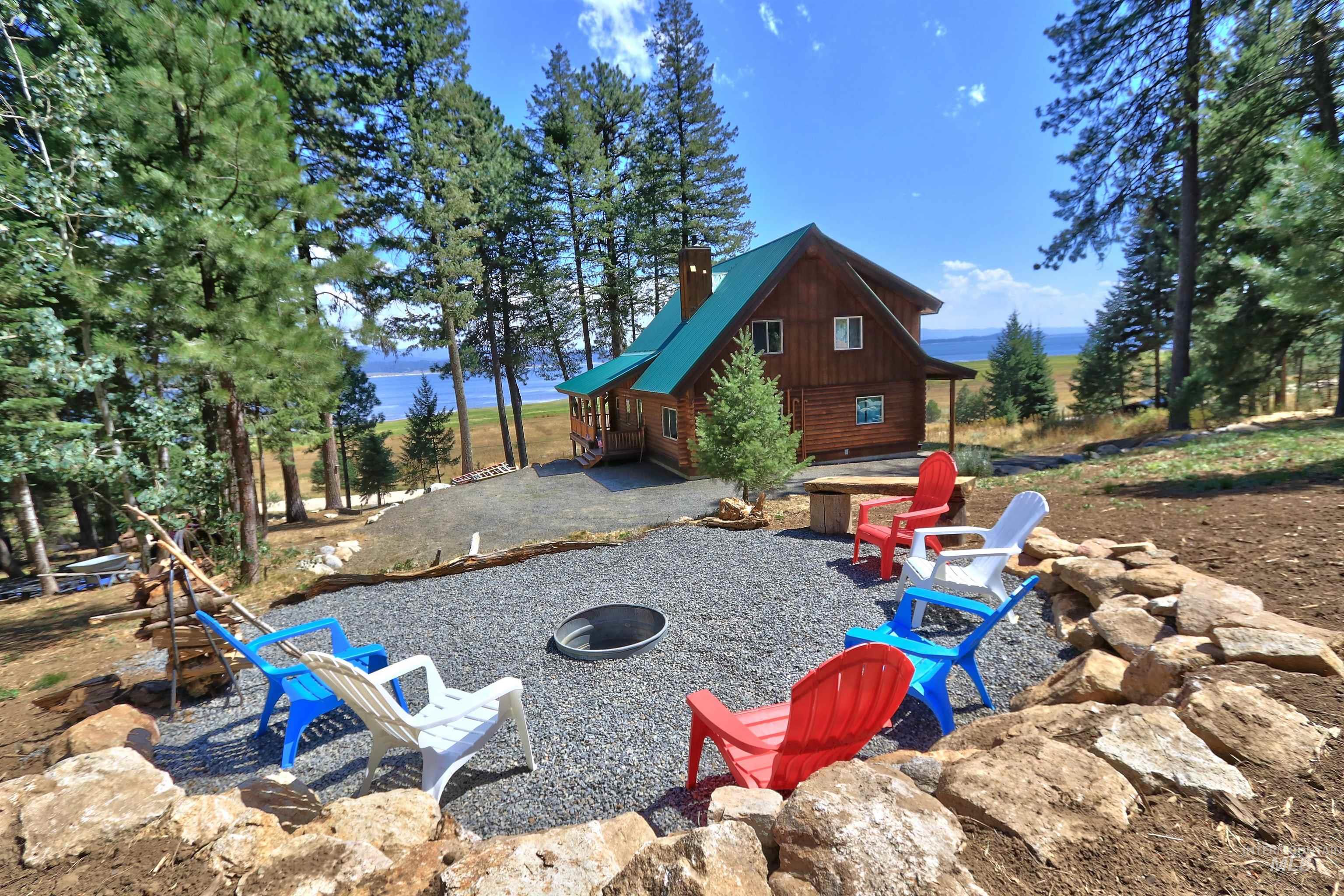 View of patio / terrace with an outdoor fire pit