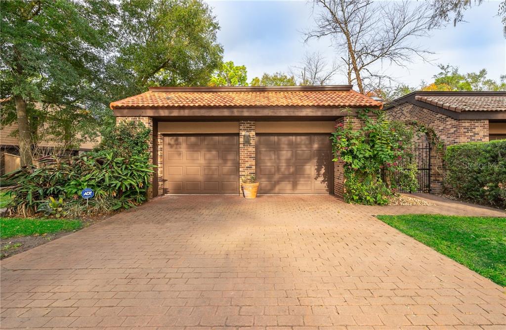 THE SPRINGS, Whispering Pines, NEW TILE ROOF, two car garage, courtyard entry. 2354 Sq. ft., 3 exterior decks, a real architectural beauty!