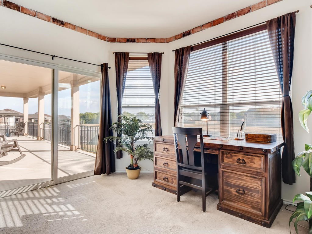 1301 Autumn Sage Way Pflugerville, TX 78660 - Photo 17 of 28 a view of workspace with a large window